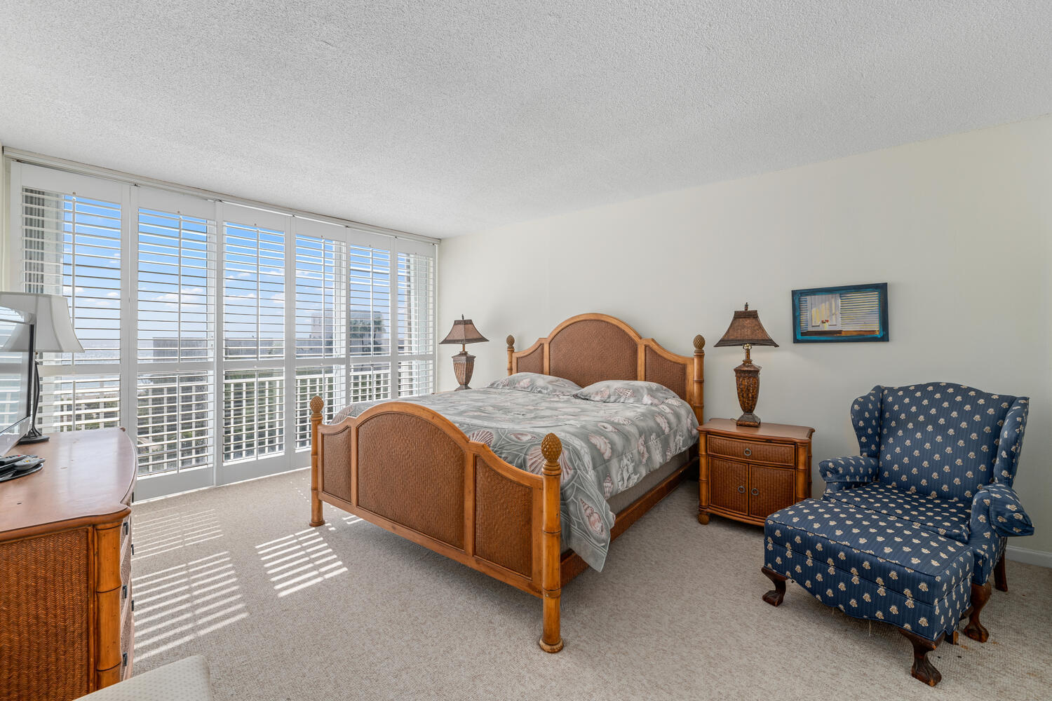 2780 South Ocean Boulevard, Unit 612 Palm Beach, FL 33480 - Photo 37 of 57 a bedroom with bed and a couch