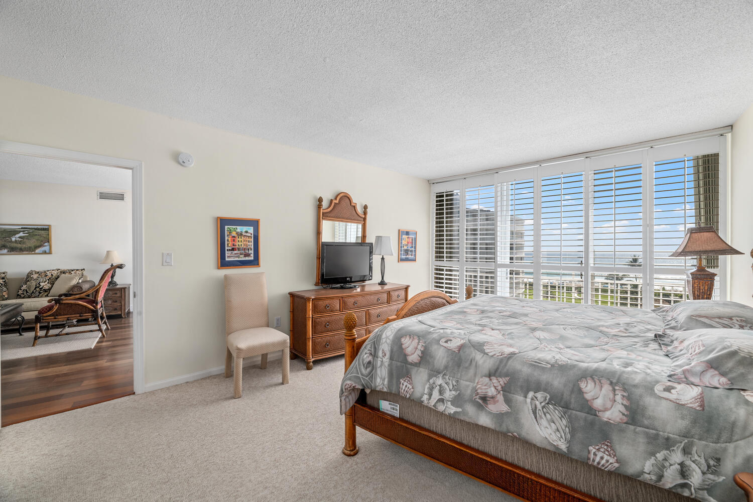 2780 South Ocean Boulevard, Unit 612 Palm Beach, FL 33480 - Photo 39 of 57 a bedroom with a bed and a table