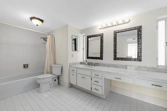 a view of a balcony with toilet and a garden