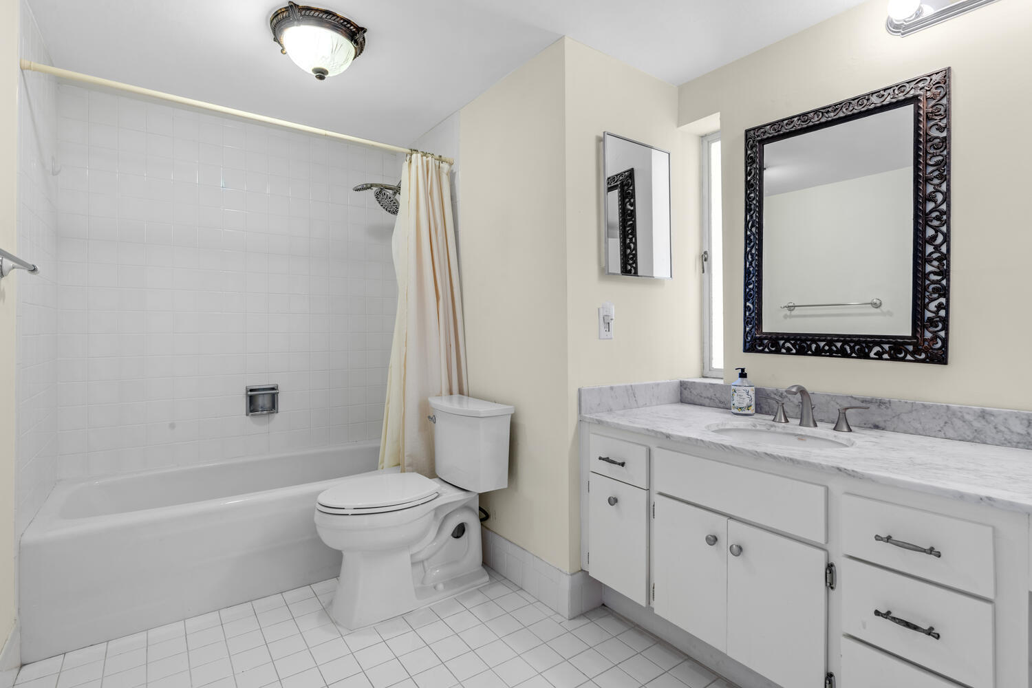 2780 South Ocean Boulevard, Unit 612 Palm Beach, FL 33480 - Photo 44 of 57 a bathroom with a double vanity sink toilet mirror and shower