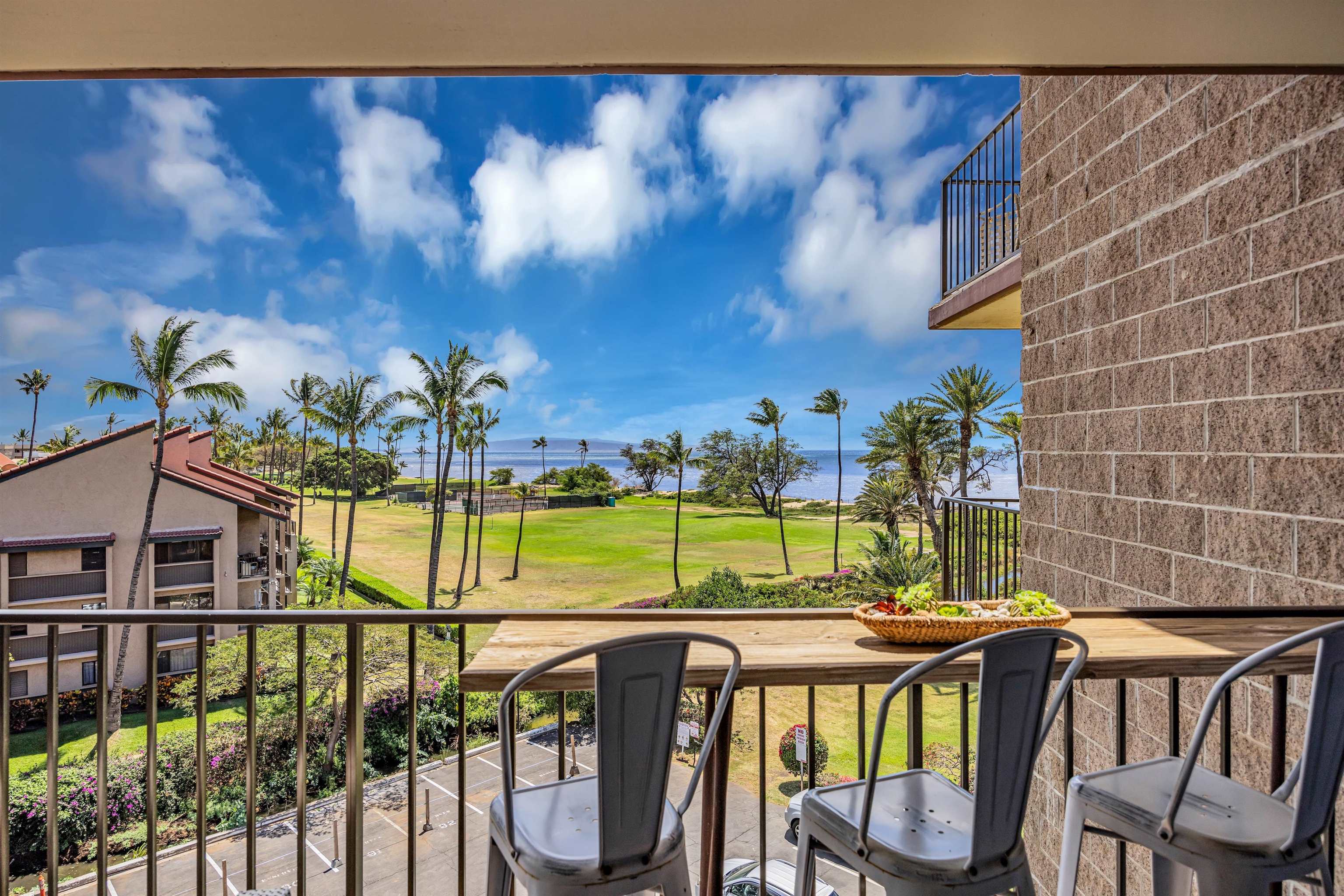 938 South Kihei Road, Unit 533 Kihei, HI 96753 - Photo 14 of 27 a view of a balcony with chairs