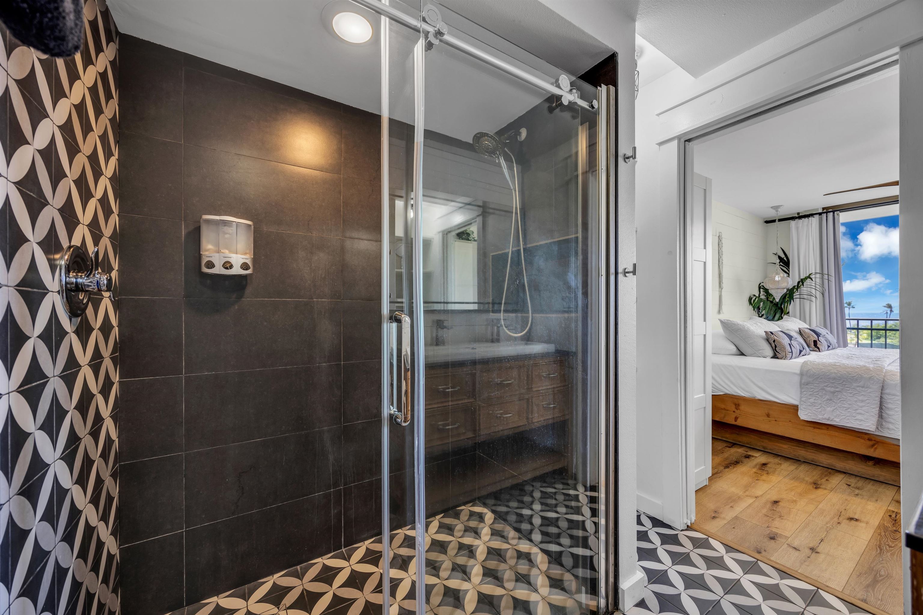 938 South Kihei Road, Unit 533 Kihei, HI 96753 - Photo 10 of 27 a bathroom with a glass door shower