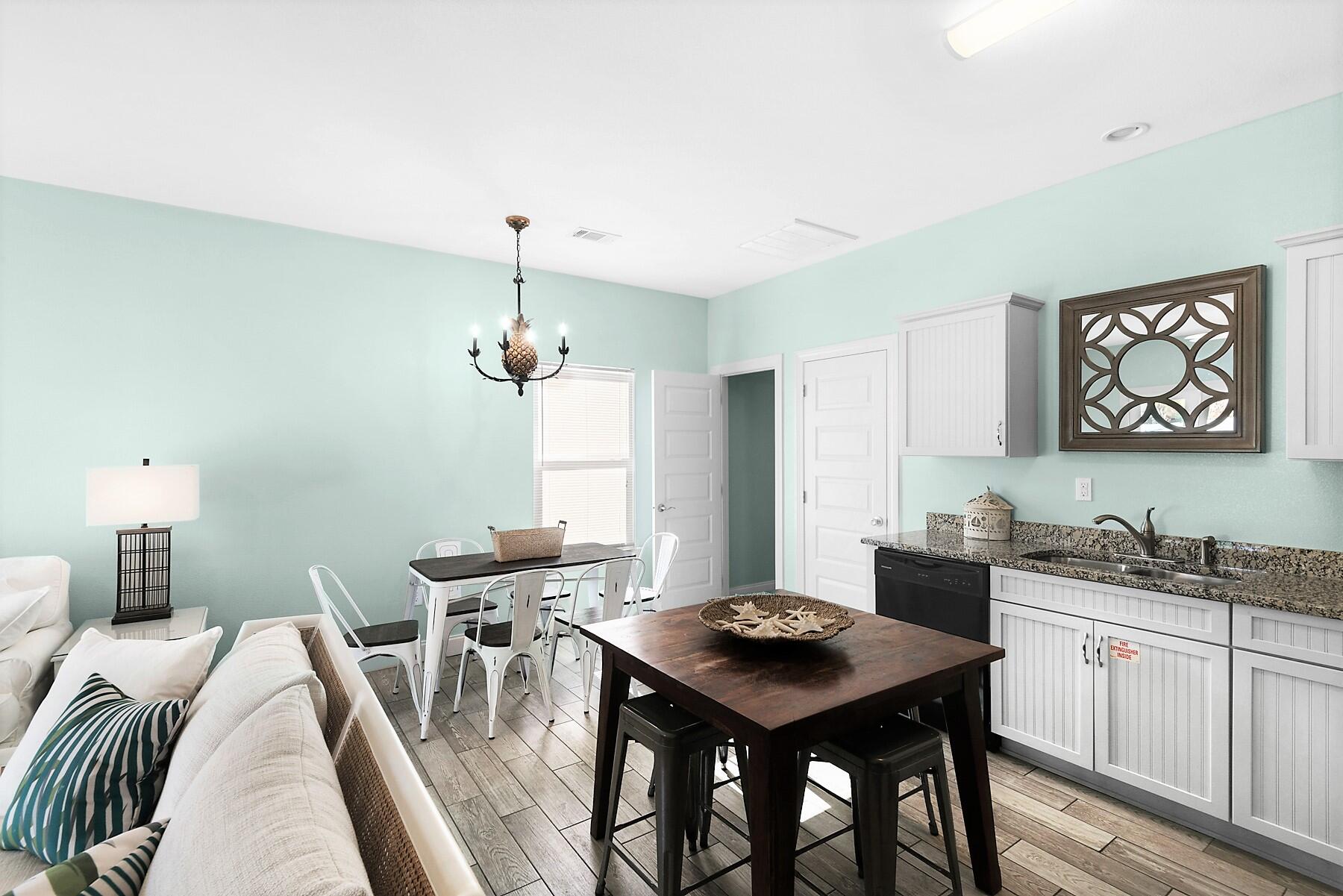 80 Pompano Street Destin, FL 32541 - Photo 48 of 71 a view of a dining room with furniture