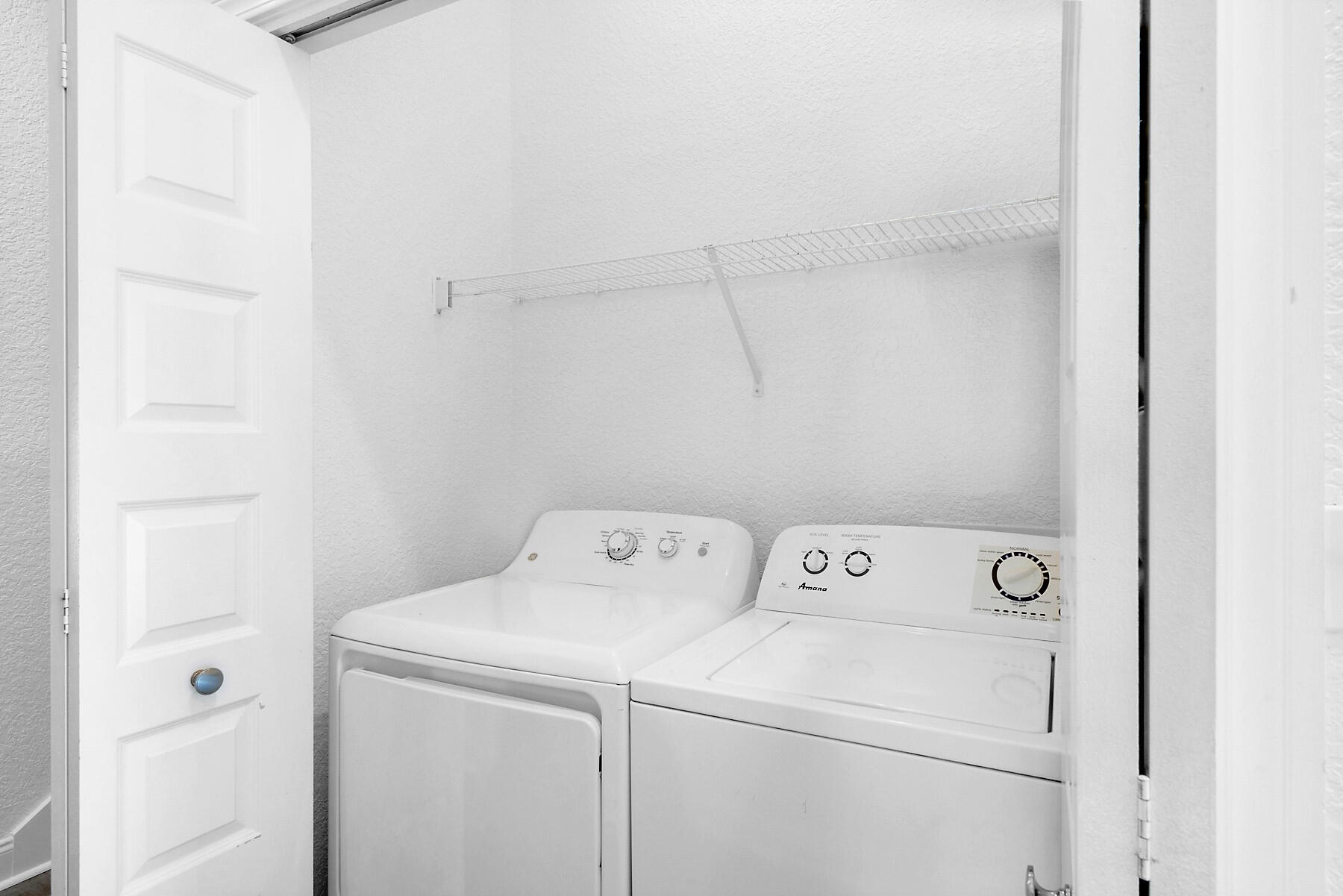 80 Pompano Street Destin, FL 32541 - Photo 58 of 71 a utility room with dryer and washer