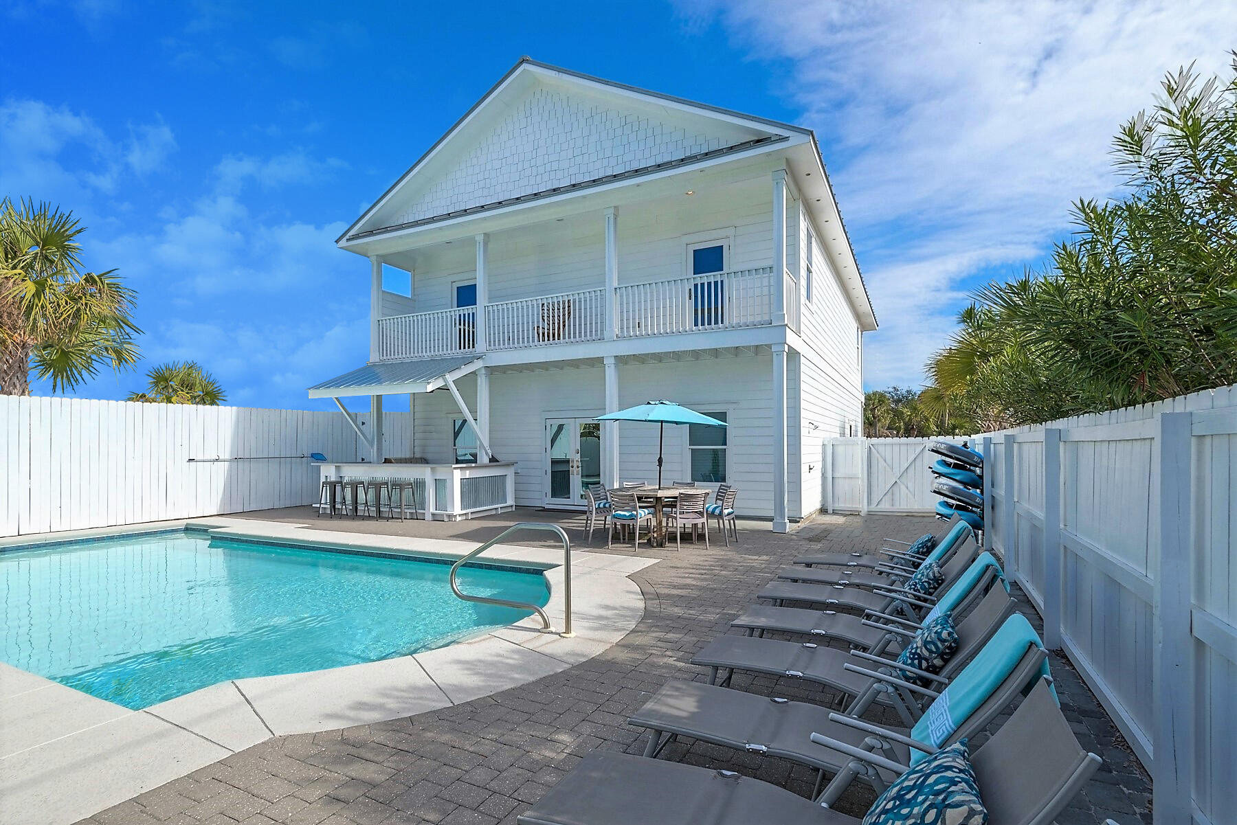 80 Pompano Street Destin, FL 32541 - Photo 9 of 71 a view of a house with swimming pool and sitting area