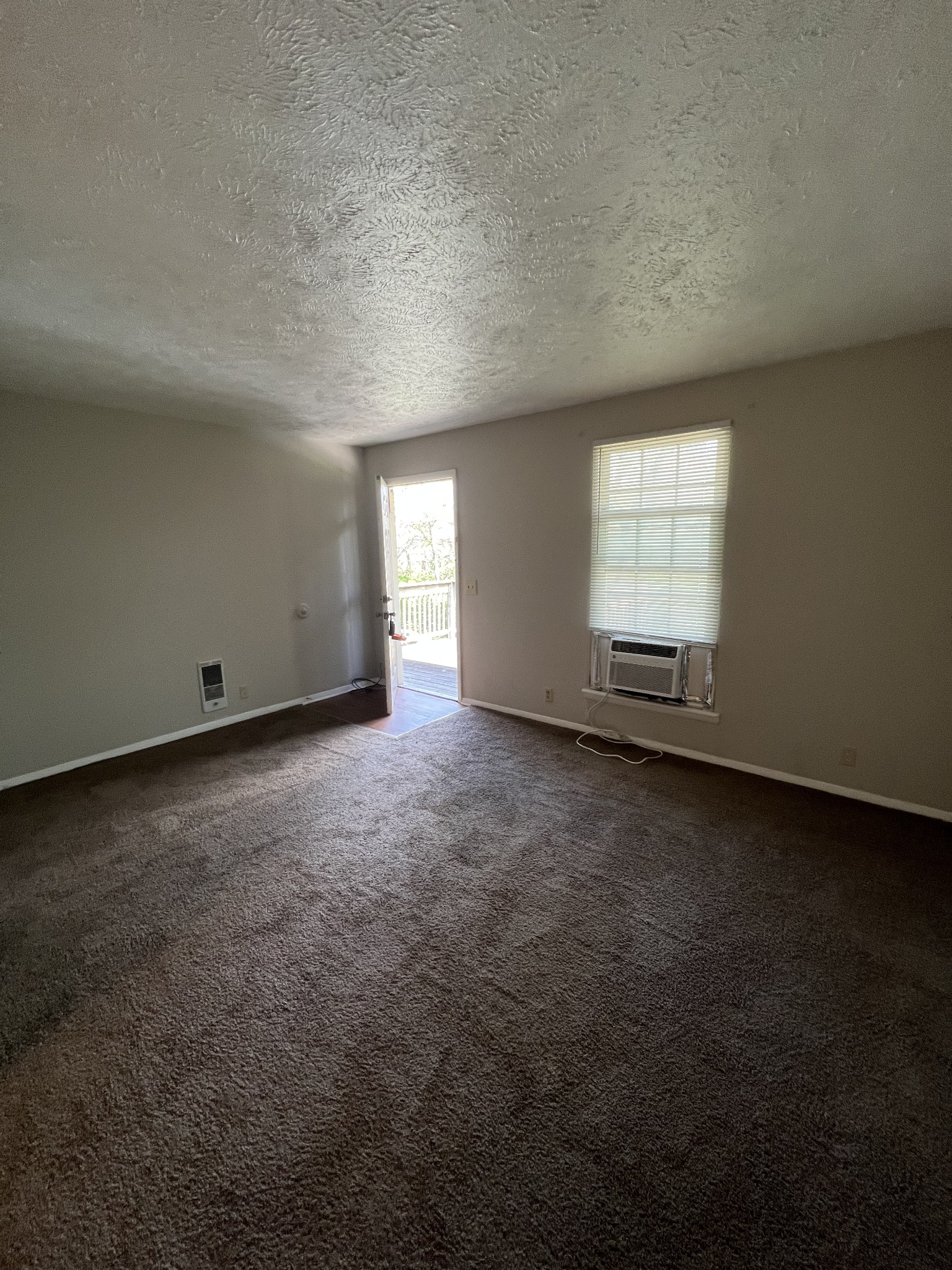 209 East Webster Street Madison, TN 37115 - Photo 13 of 33 an empty room with a empty space and windows