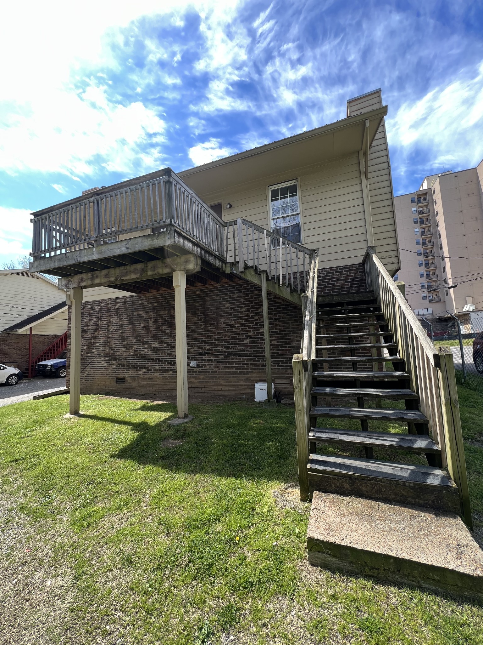 209 East Webster Street Madison, TN 37115 - Photo 24 of 33 a view of backyard with barbeque oven and stairs