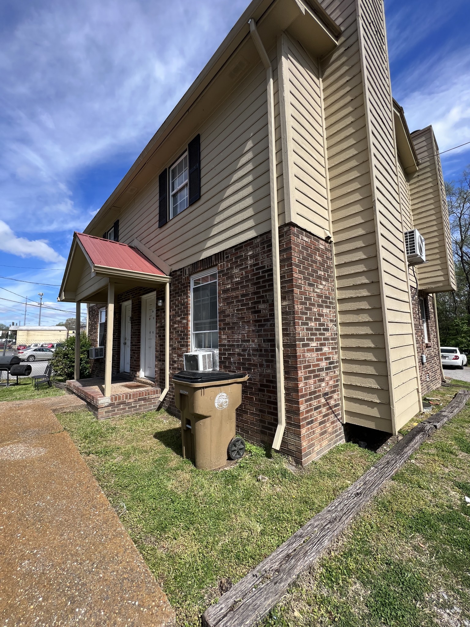 209 East Webster Street Madison, TN 37115 - Photo 9 of 33 a front view of a house with porch