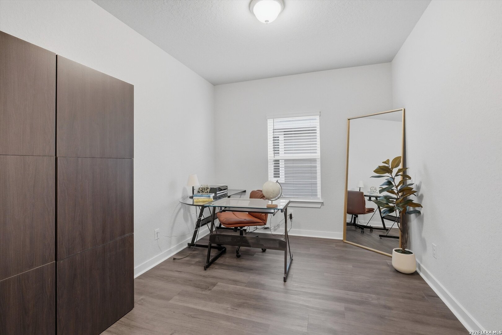 10776 Rosalina Loop Converse, TX 78109 - Photo 13 of 31 a living room with furniture and a potted plant