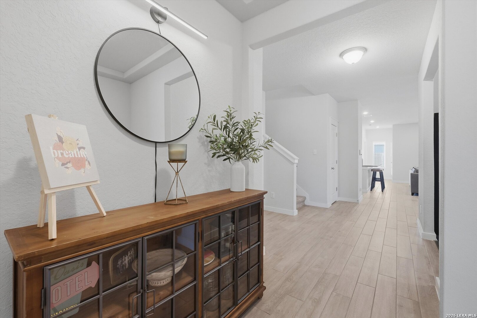 10776 Rosalina Loop Converse, TX 78109 - Photo 14 of 31 a view of a livingroom with furniture and wooden floor