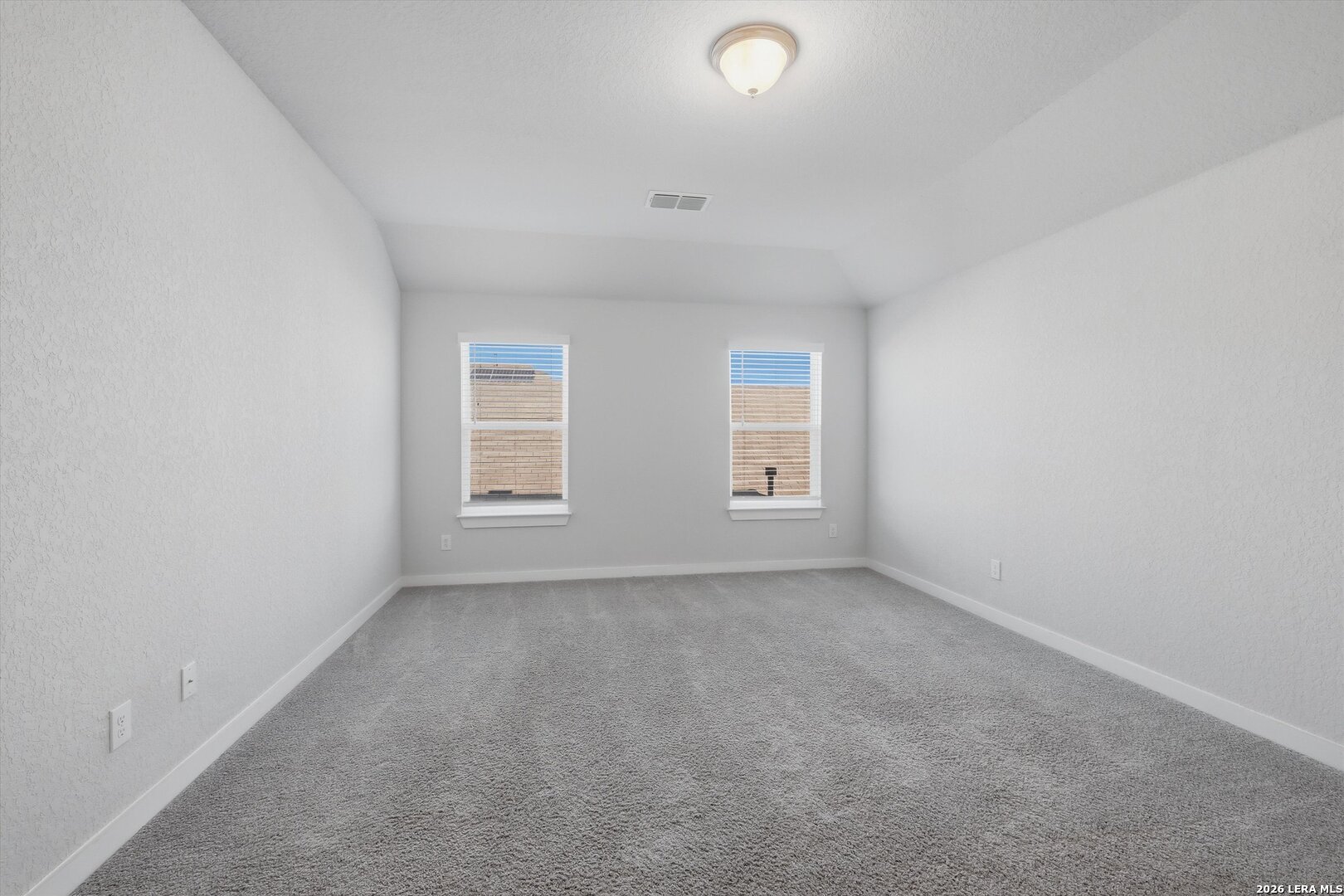 10776 Rosalina Loop Converse, TX 78109 - Photo 16 of 31 an empty room with windows