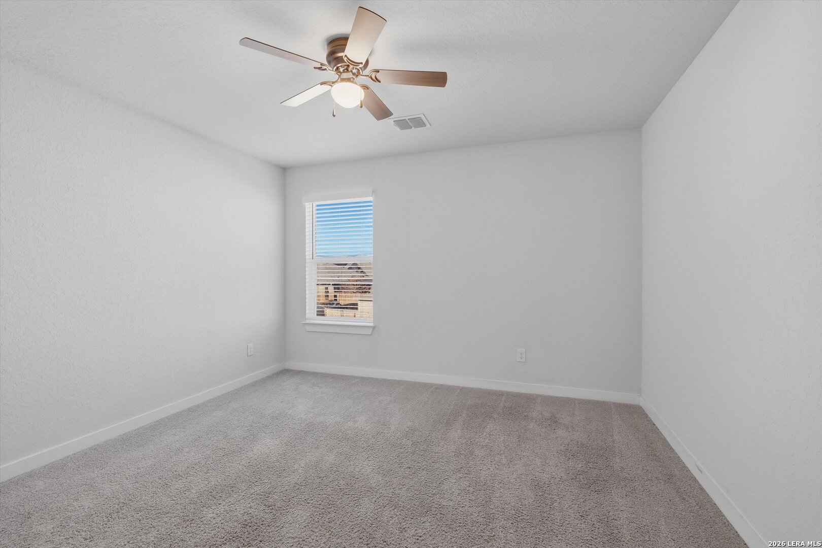 10776 Rosalina Loop Converse, TX 78109 - Photo 18 of 31 a view of room with a ceiling fan