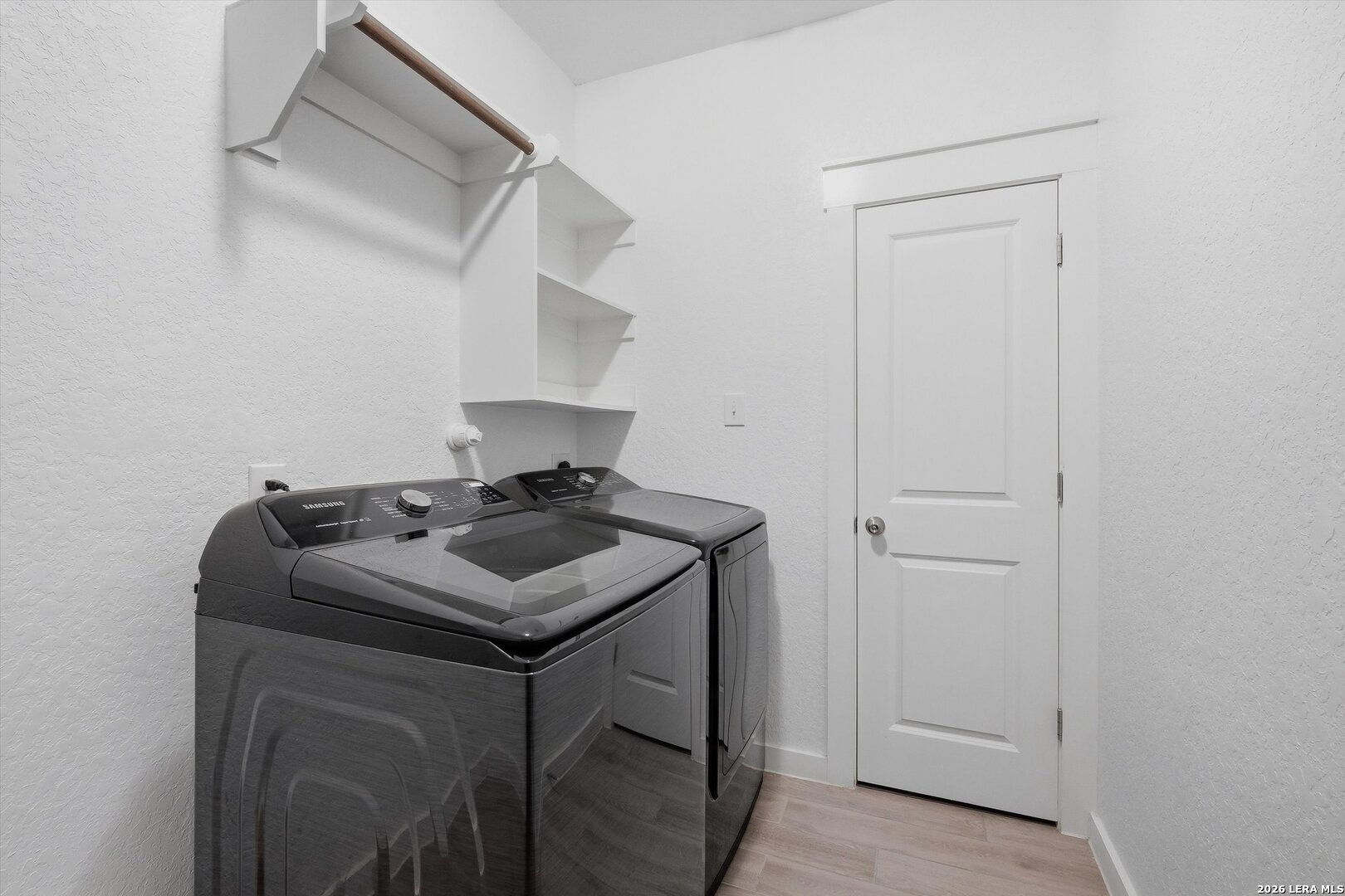 10776 Rosalina Loop Converse, TX 78109 - Photo 28 of 31 a bathroom with a sink toilet and cabinets