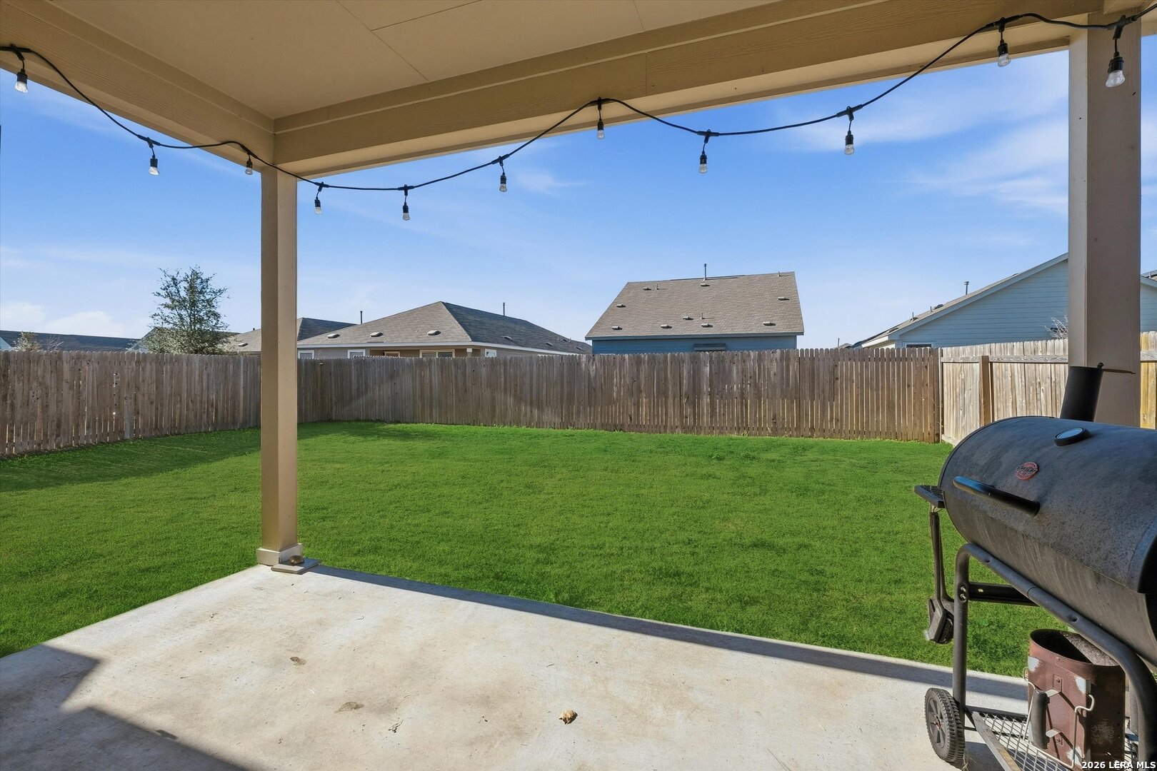 10776 Rosalina Loop Converse, TX 78109 - Photo 29 of 31 a view of a backyard with wooden fence