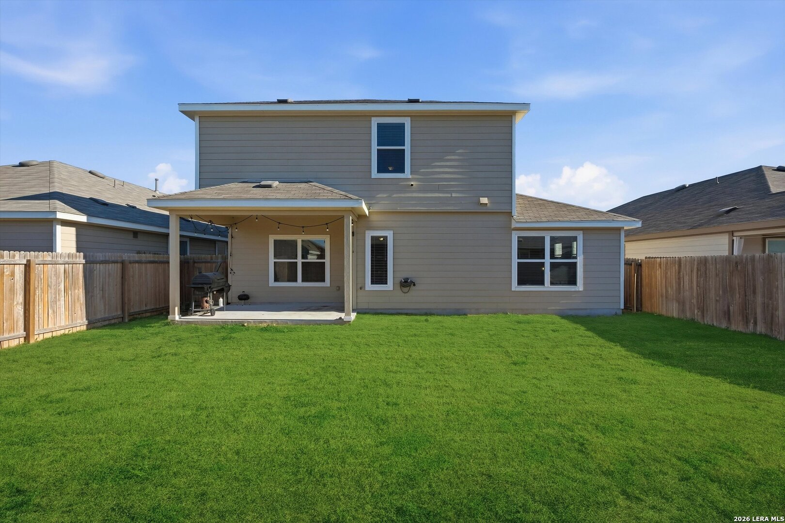 10776 Rosalina Loop Converse, TX 78109 - Photo 31 of 31 a front view of a house with a garden