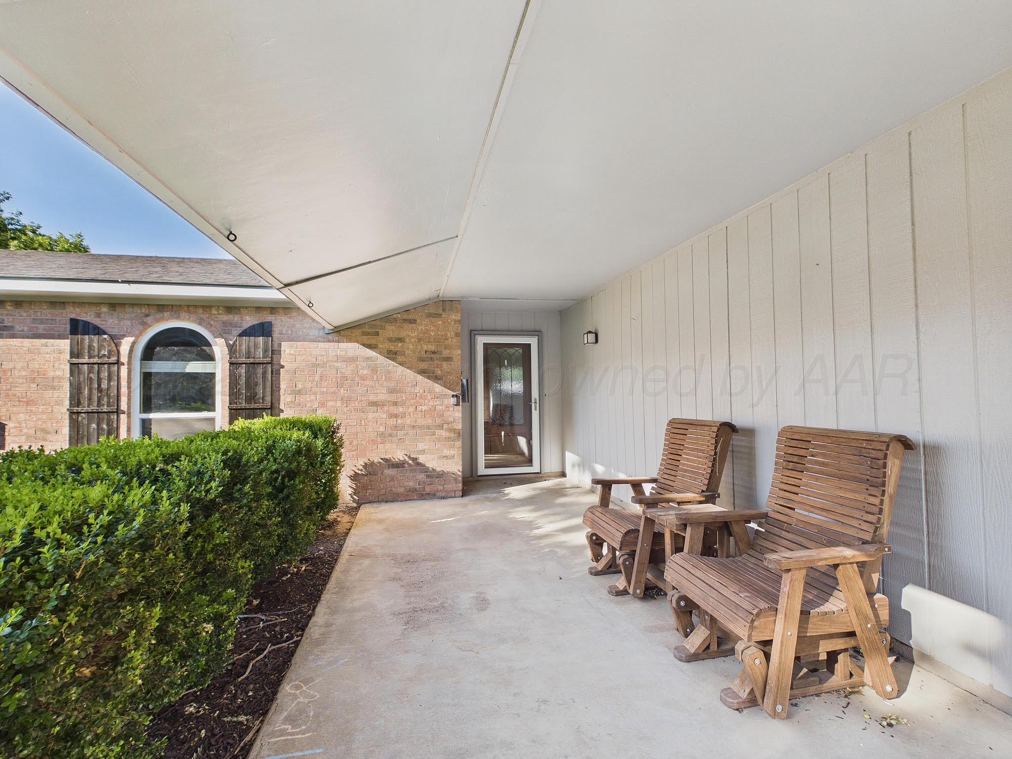 2818 John Drive Amarillo, TX 79110 - Photo 2 of 22 coverd front porch
