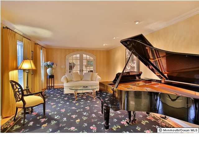 11 Pirates Cove Road Little Silver, NJ 07739 - Photo 6 of 14 a living room with furniture and a piano