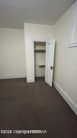 a bathroom with a toilet a sink and bathtub