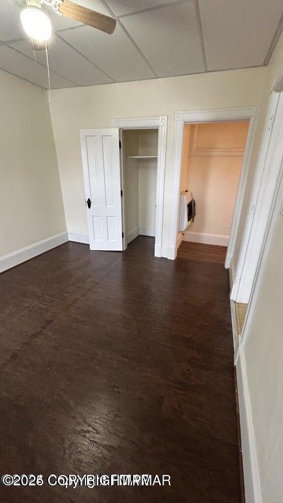 424 Main Street, Unit 7 Stroudsburg, PA 18360 - Photo 4 of 15 a view of an empty room with wooden floor and a window