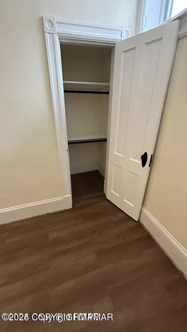 a view of a hallway with window