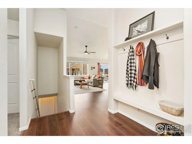 a view of a living room and entryway