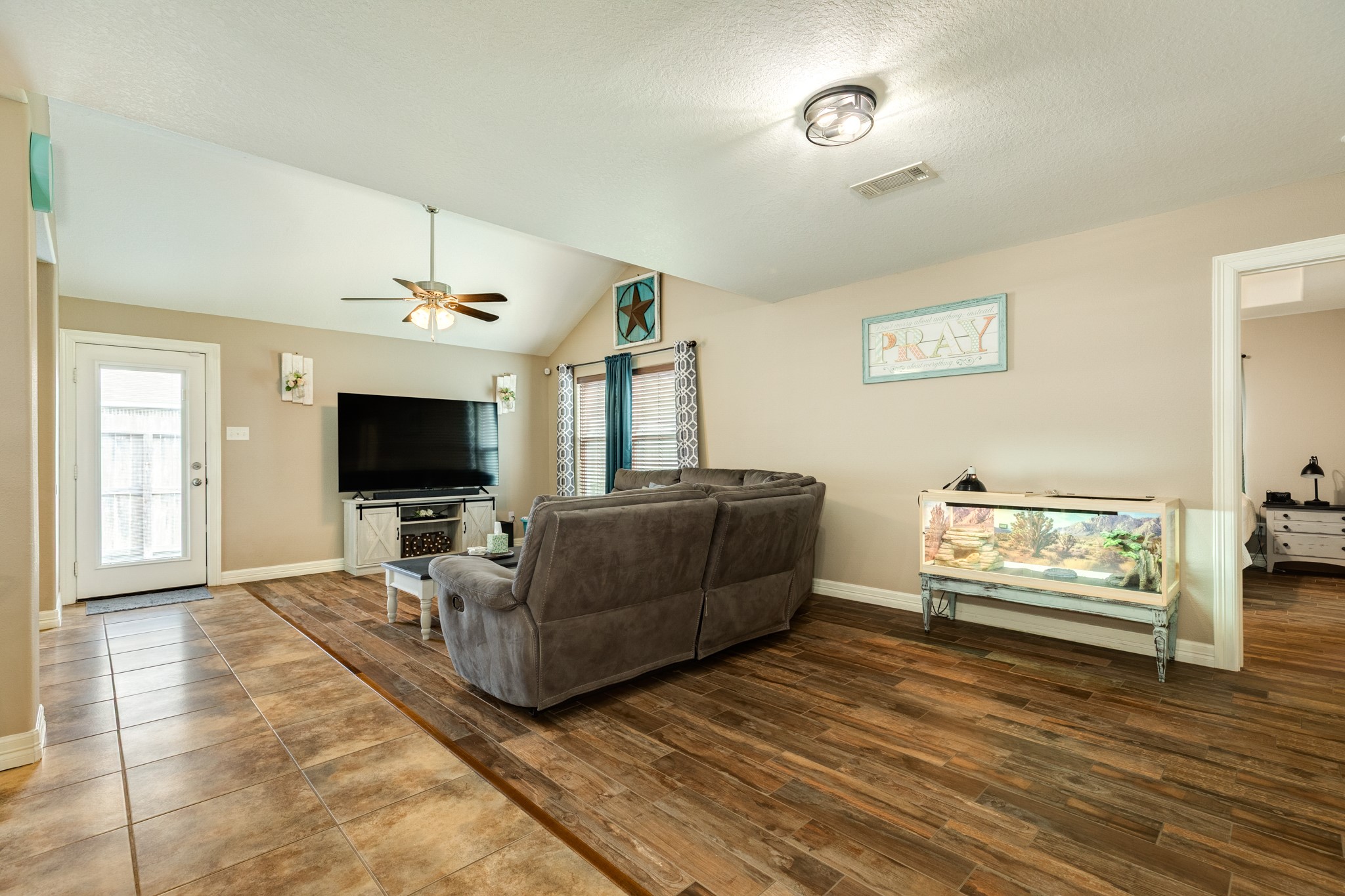 6108 Fox Ridge Drive Angleton, TX 77515 - Photo 7 of 26 a living room with furniture and a flat screen tv