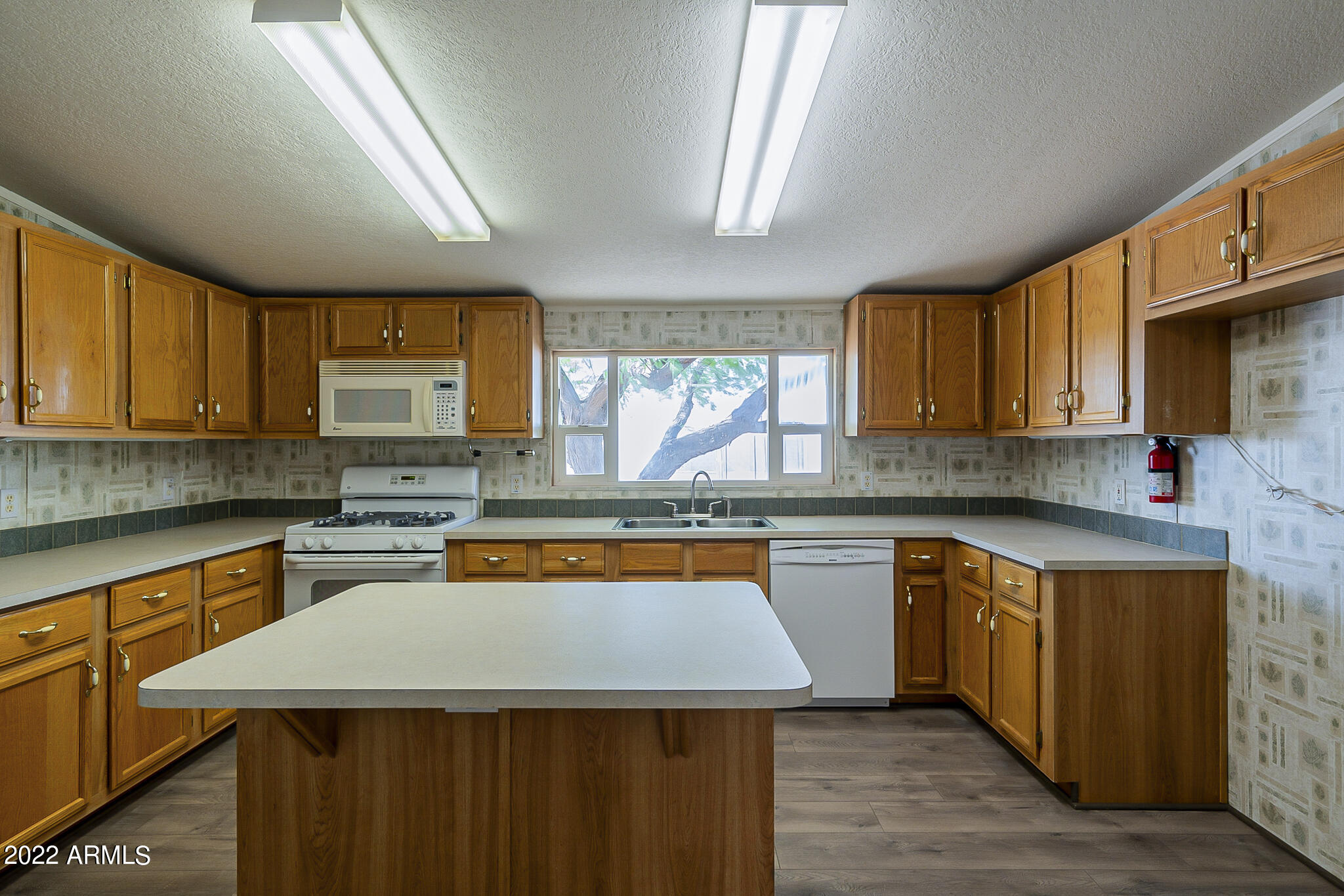 11596 Stagecoach Road Arizona City, AZ 85123 - Photo 11 of 45 Kitchen with island