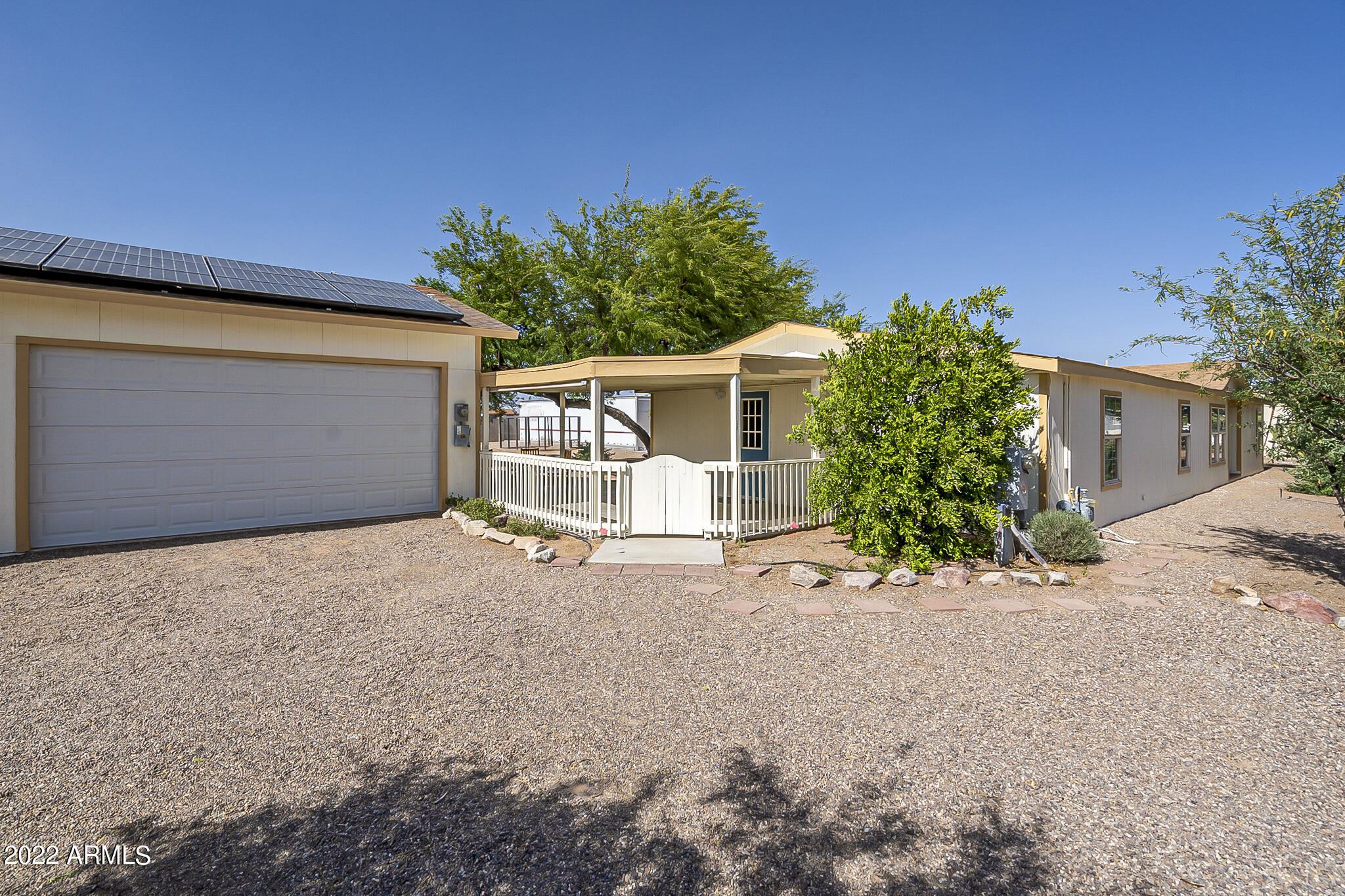 11596 Stagecoach Road Arizona City, AZ 85123 - Photo 2 of 45 Side patio and garage