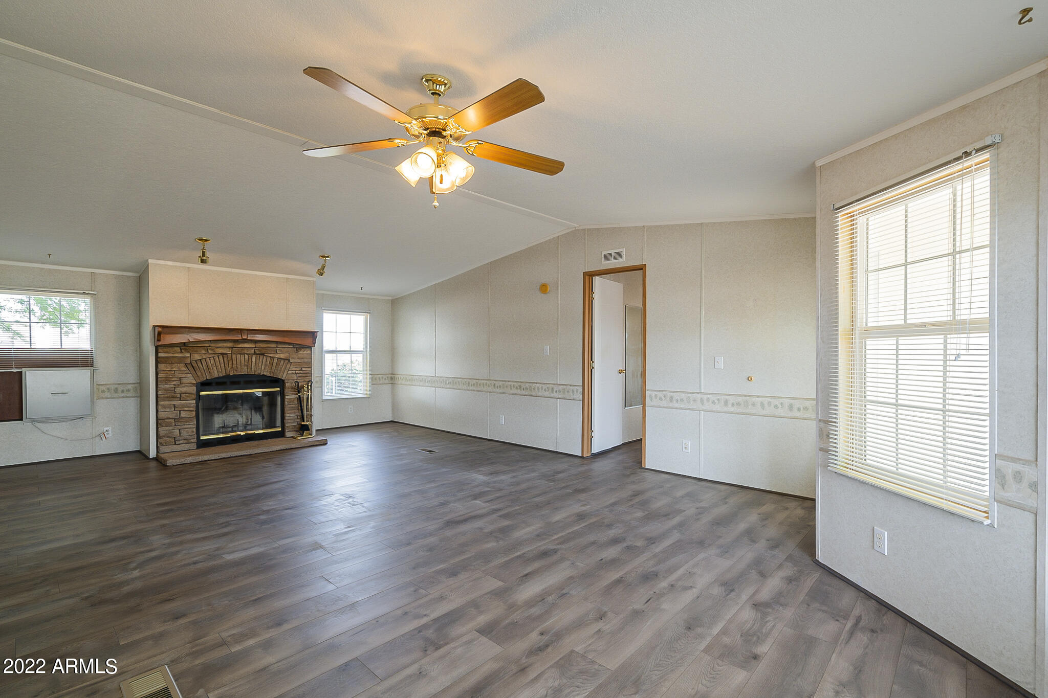 11596 Stagecoach Road Arizona City, AZ 85123 - Photo 39 of 45 Living area view 4 with fireplace