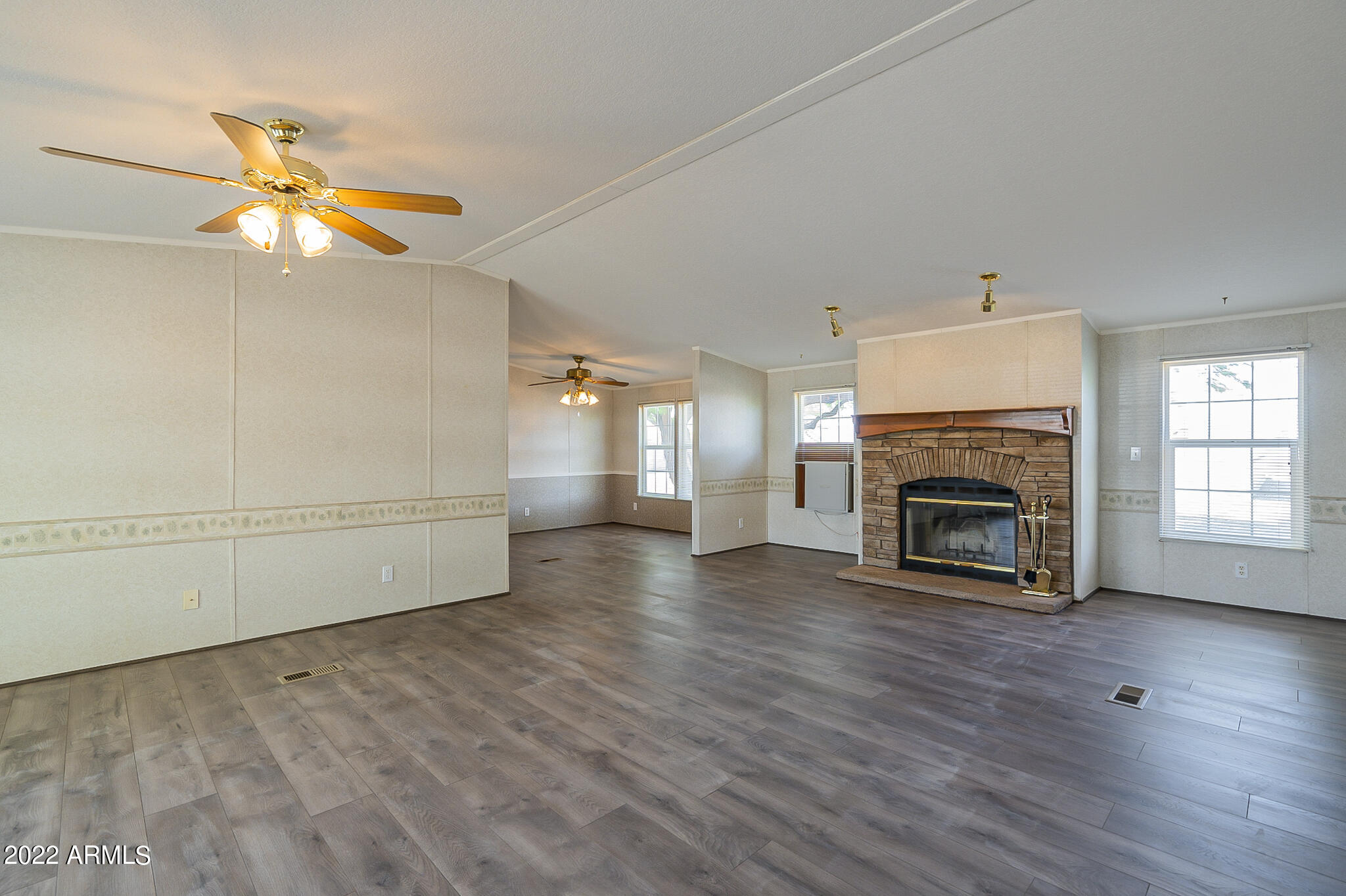 11596 Stagecoach Road Arizona City, AZ 85123 - Photo 6 of 45 Living area with fireplace