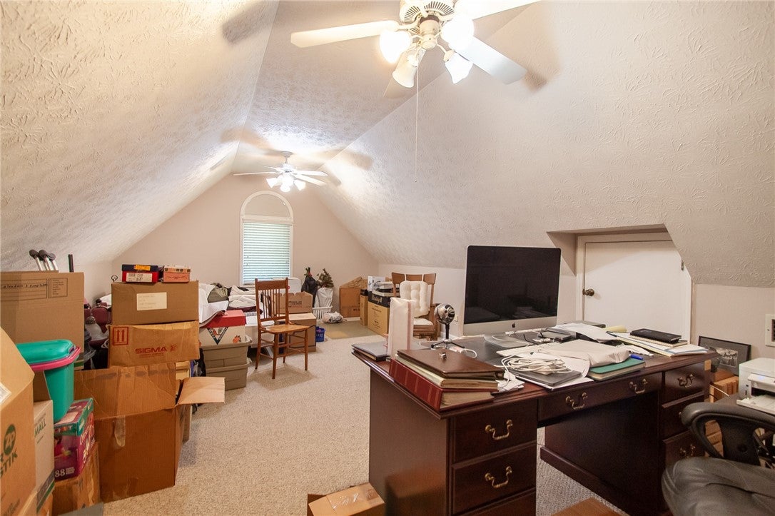 575 Deer Run Road Auburn, AL 36832 - Photo 26 of 42 There is great space in the upstairs bonus room. As you can see, the sellers have already started packing.