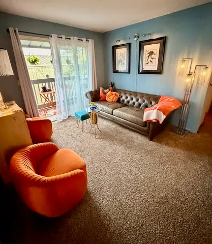 a room with furniture and window