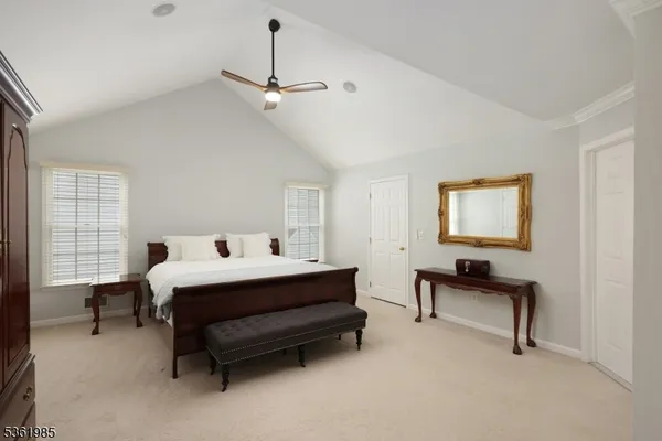 a bed room with a bed and a window