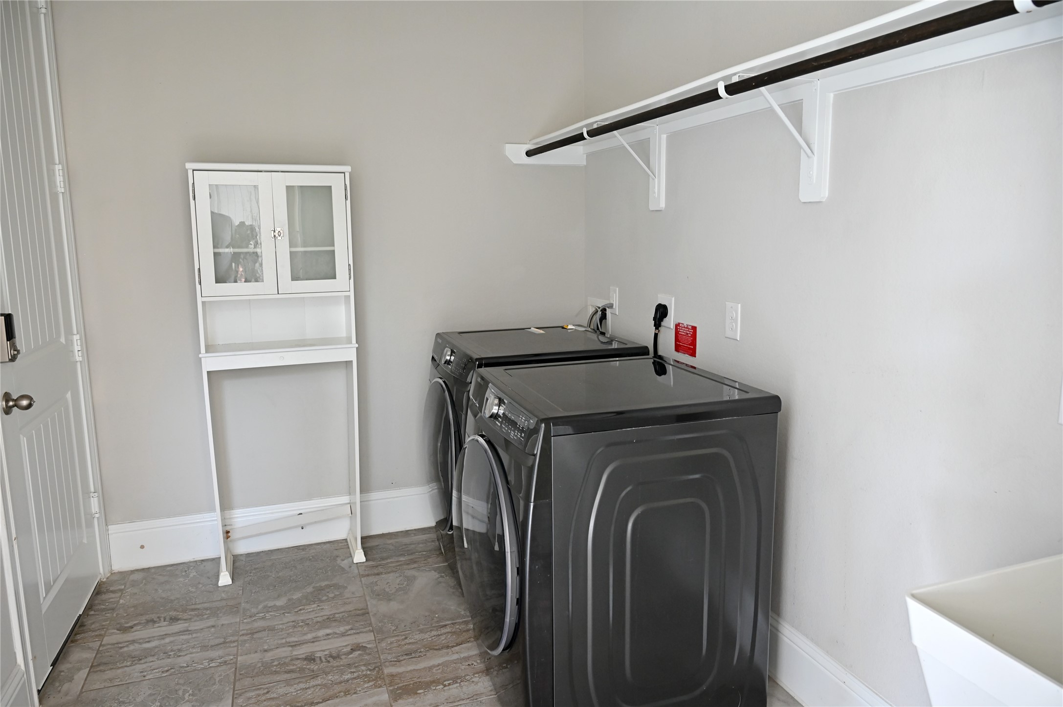 28919 Copper Break Court Katy, TX 77494 - Photo 12 of 31 a utility room with dryer and washer