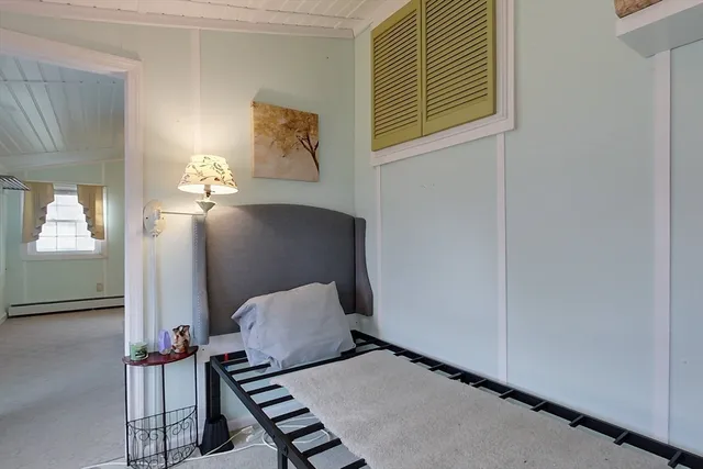 a picture of a room with wooden floor