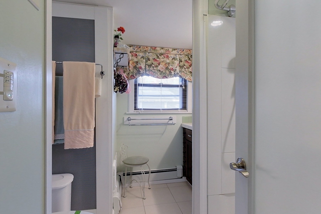 239 Ayer Road, Unit 46 Littleton, MA 01460 - Photo 21 of 28 a bathroom with a toilet and a shower