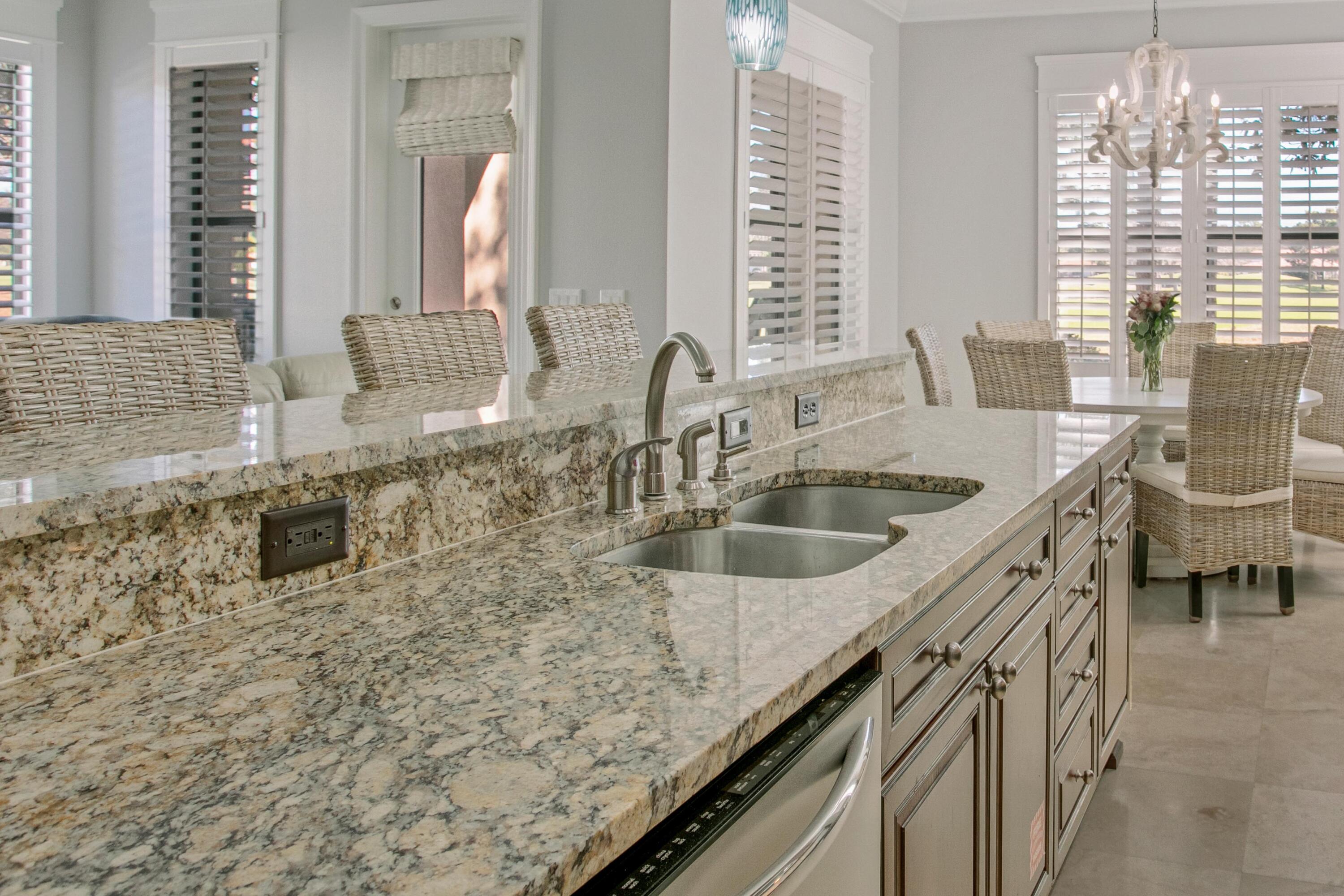 1893 Baytowne Loop Miramar Beach, FL 32550 - Photo 16 of 45 a kitchen with granite countertop a sink and a window