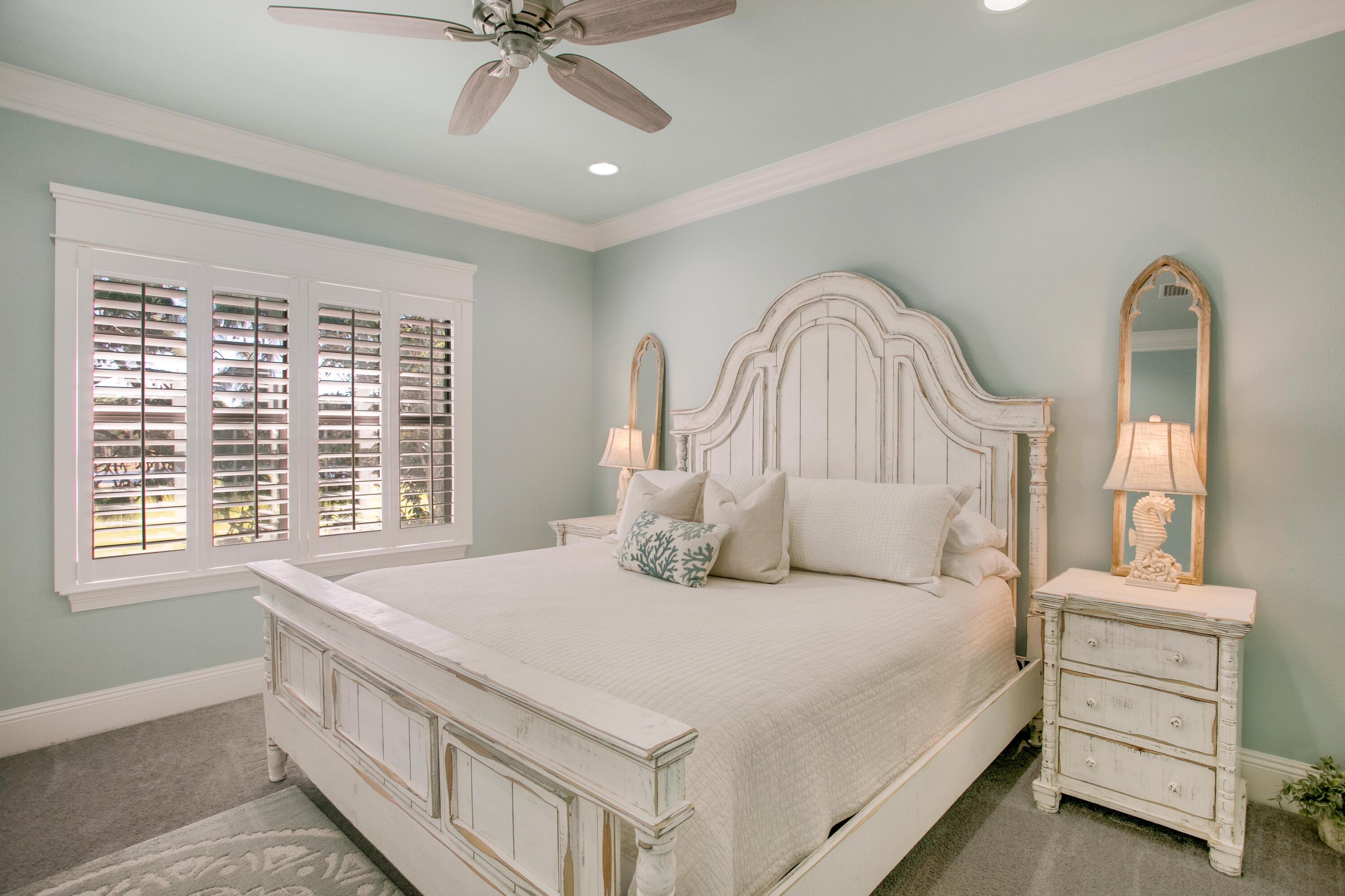 1893 Baytowne Loop Miramar Beach, FL 32550 - Photo 29 of 45 a bedroom with a bed and a dresser