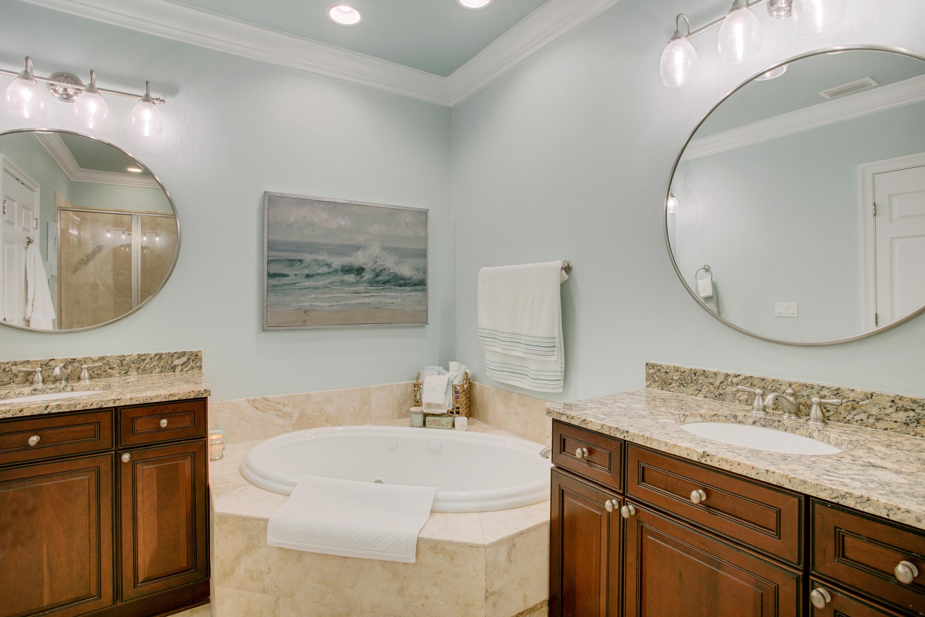 1893 Baytowne Loop Miramar Beach, FL 32550 - Photo 32 of 45 a spacious bathroom with a sink double vanity and a mirror