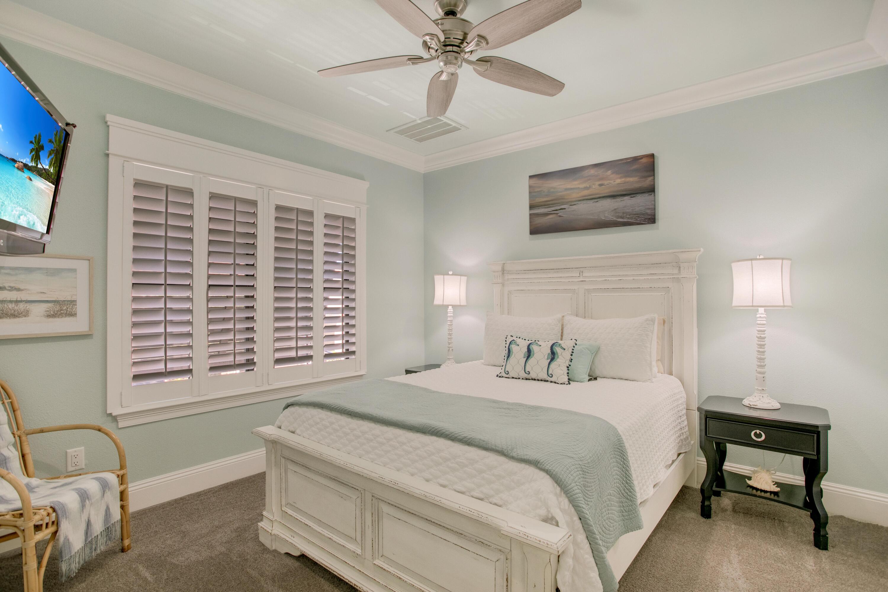 1893 Baytowne Loop Miramar Beach, FL 32550 - Photo 37 of 45 a bedroom with a bed and a window