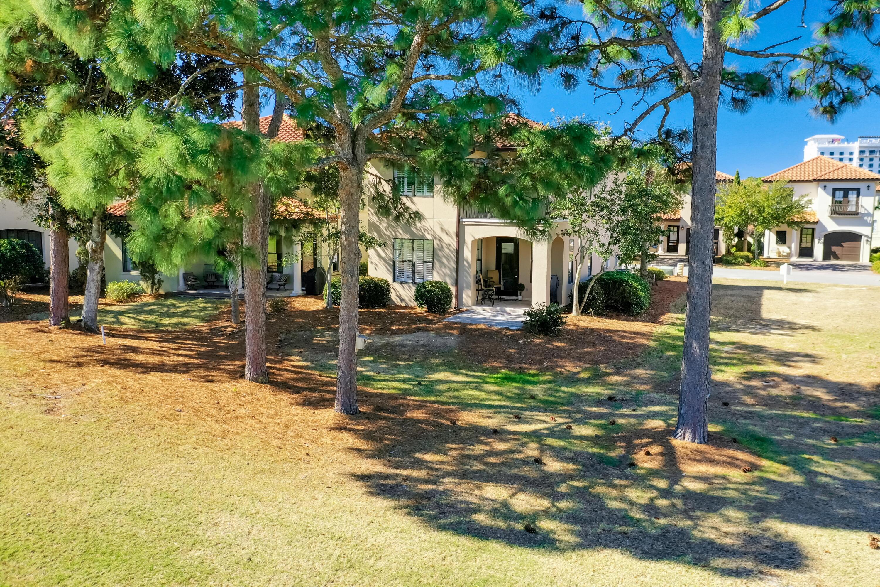 1893 Baytowne Loop Miramar Beach, FL 32550 - Photo 6 of 45 a view of road with large trees