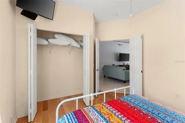 a living room with a bed and furniture