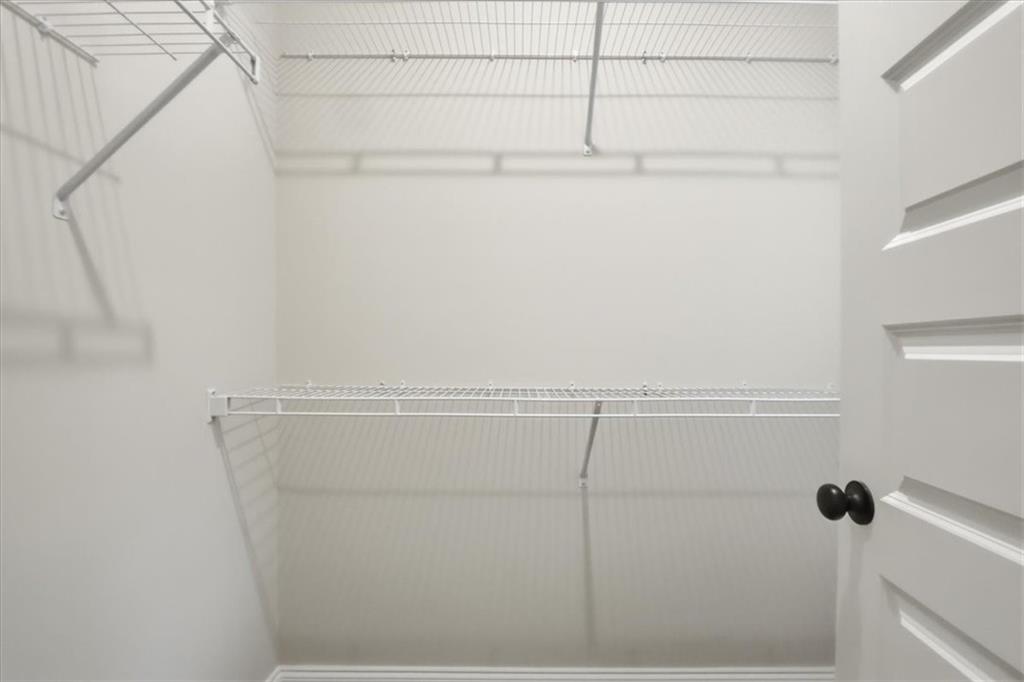 49 Wright Street, Unit 65 Lavonia, GA 30553 - Photo 10 of 17 a view of small space with racks on the wall