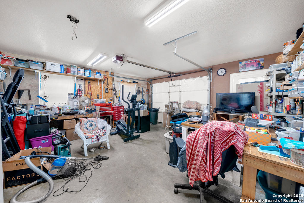 16020 Farm To Market Road 463 Lytle, TX 78052 - Photo 26 of 39 a view of a room with lots of stuff