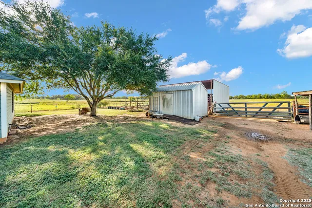 a view of an outdoor space and a yard