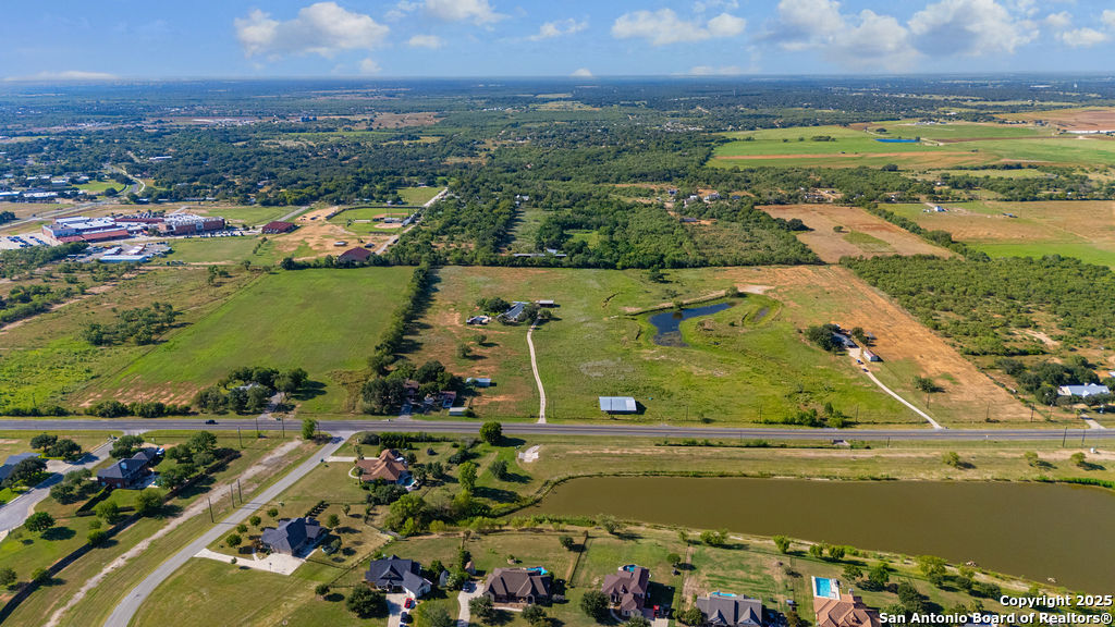 16020 Farm To Market Road 463 Lytle, TX 78052 - Photo 8 of 39 an aerial view of ocean and residential houses with outdoor space