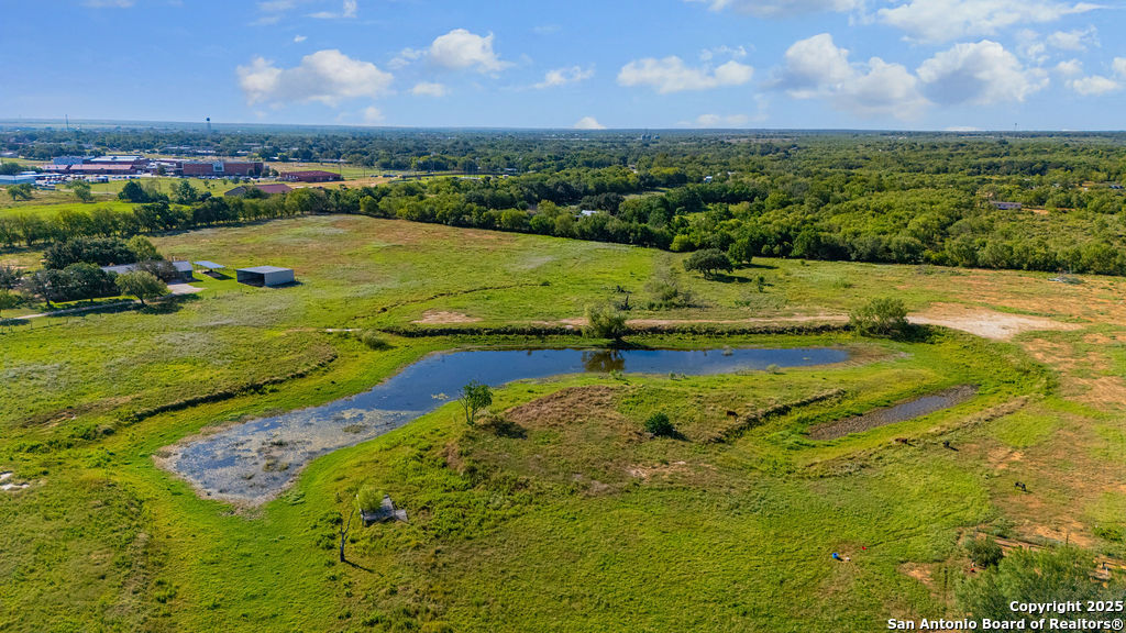16020 Farm To Market Road 463 Lytle, TX 78052 - Photo 10 of 39 a view of an outdoor space and a lake view