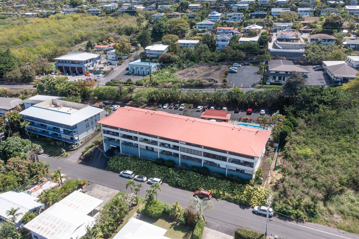 77-6585 Sea View Circle, Unit 104 Kailua-Kona, HI 96740 - Photo 23 of 23 an aerial view of a house with yard swimming pool and outdoor seating