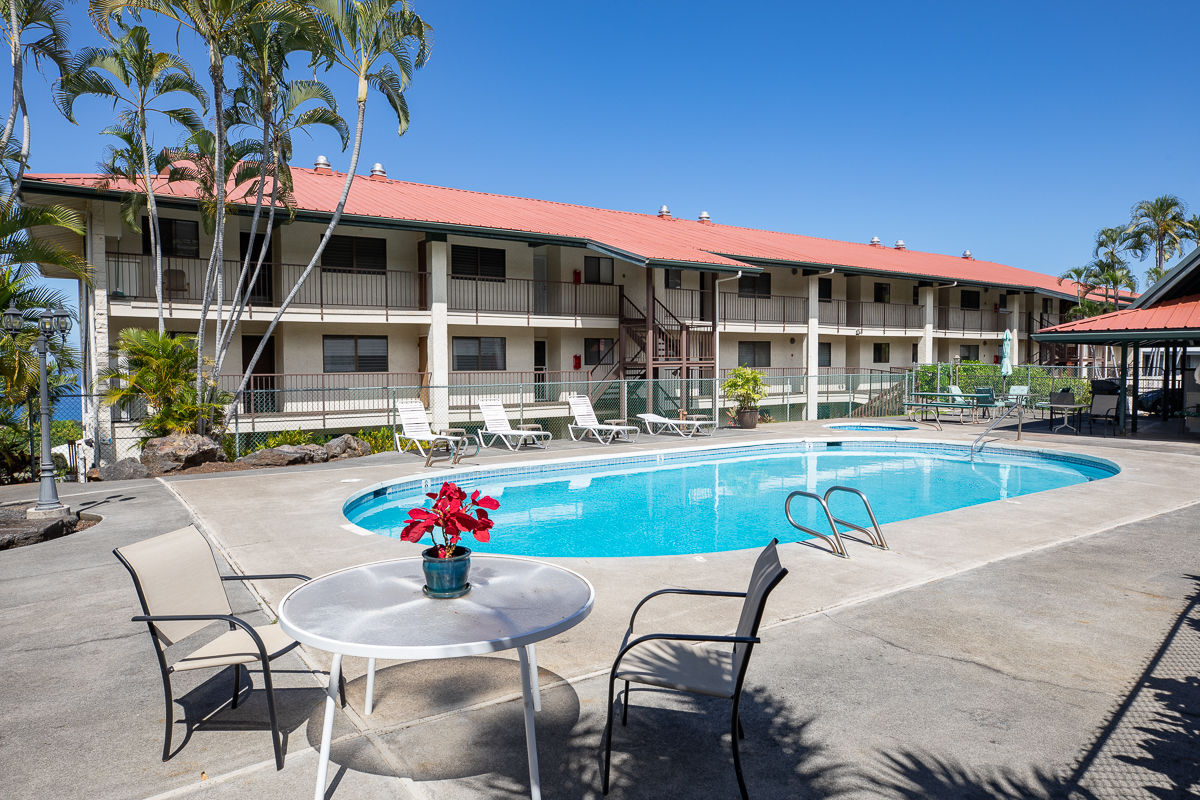 77-6585 Sea View Circle, Unit 104 Kailua-Kona, HI 96740 - Photo 6 of 23 a view of pool with outdoor seating