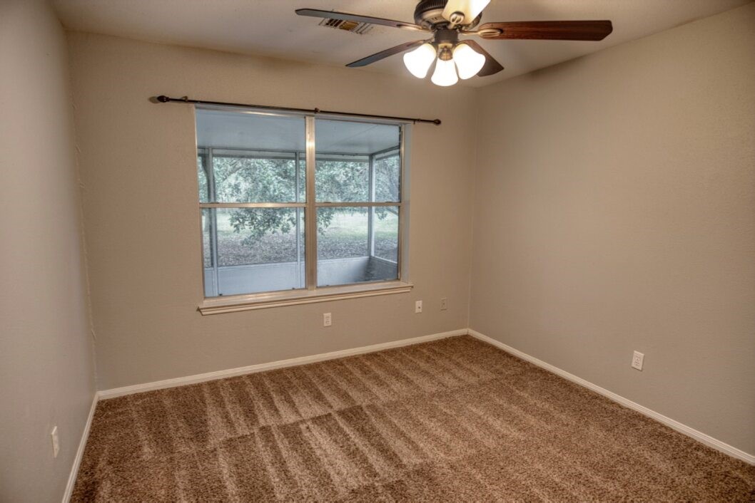 308 County Road 893B Angleton, TX 77515 - Photo 28 of 41 a view of an empty room with a window